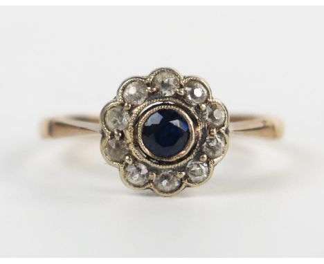 Antique Sapphire and White Stone Cluster Ring in an unmarked gold setting, 9mm head, size K.25, 1.4g 