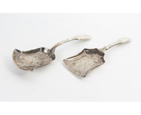 A George IV silver caddy spoon, Birmingham 1824, Thomas Millington, together with another Birmingham 1819, 10 grams, (2). 