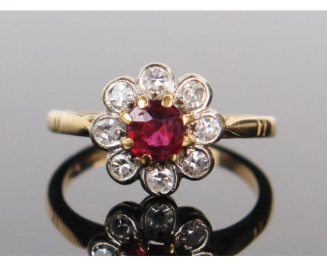 Modern 18ct Gold, Ruby and Diamond Cluster Ring, c. 11mm head, size L.25, 3.3g 