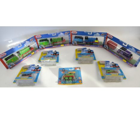 Nine Fisher Price Thomas the Tank Engine 'Trackmaster' and 'Take-n-Play' models, boxed as new. (9)Provenance: Single owner st