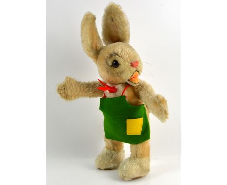 Steiff rabbit in a green apron,.    
