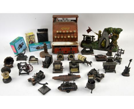 A tin plate Codeg child's imitation cash register, a cast iron boy scout model and a collection of Play Me diecast miniature 
