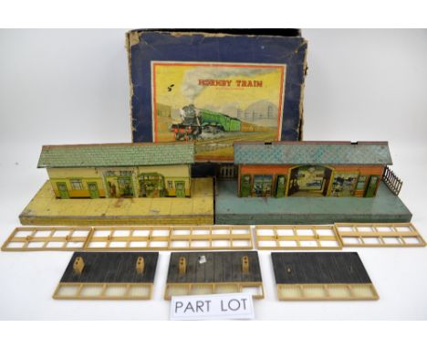 A Hornby Train tinplate clockwork locomotive outfit and a Marklin HO scale AC set, both boxed, together with a quantity of ti