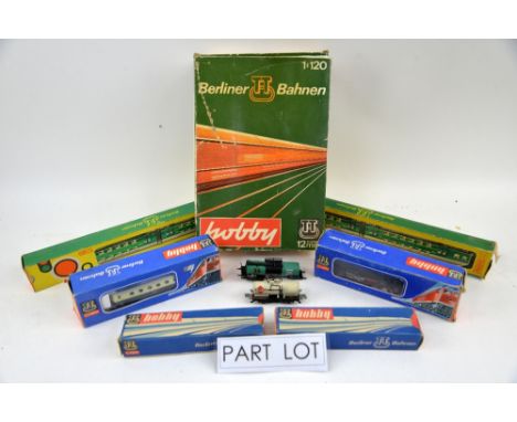 A quantity of boxed Berliner Bahnen 12mm 1:120 scale trains, carriages and wagons. (qty)Provenance: Single owner stock collec
