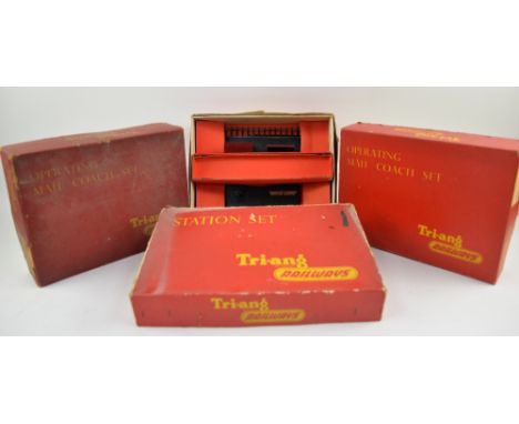 Three Tri-ang Railways Operating Mail Coach Sets and a Station Set, all boxed, completeness unchecked. (4)Provenance: Single 