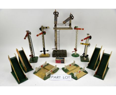 A quantity of tin plate railway signals and crossings including Hornby. (qty)Provenance: Single owner stock collection of Rob