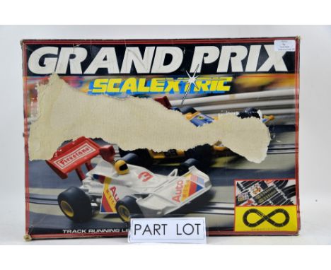 Three Scalextric sets; Monster Trucks C1024, Grand Prix C1025 and Grand Prix C573, all boxed, completeness unchecked. (3)Sing