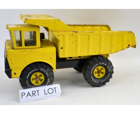 Three Tonka large scale pressed metal construction vehicles including 'Mighty Shovel' and 'Turbo Diesel'. (3)Provenance: Sing