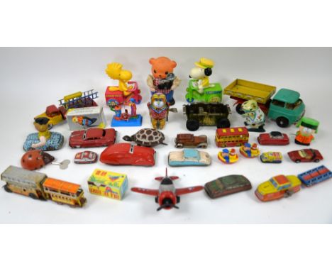 A quantity of predominantly Chinese and Japanese tinplate and clockwork toys. (qty)Provenance: Single owner stock collection 