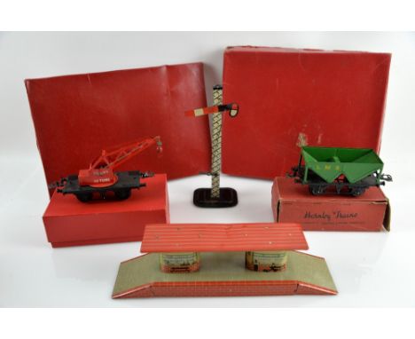 A Hornby Trains 0 gauge Crane Truck No.1, Hopper Wagon, CA1 acute-angle crossing and points, all boxed, together with a tin p