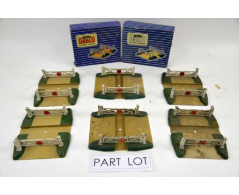 A quantity of Hornby Dublo D1 Level Crossings (four boxed) and others. (qty)Provenance: Single owner stock collection of Robe