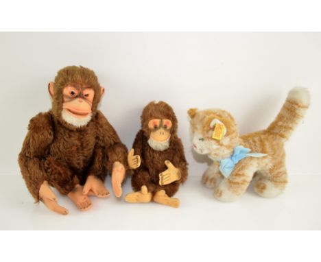 Two Steiff chimps (lacking tags) and a 'Lizzy' kitten (2728/17). (3).    
