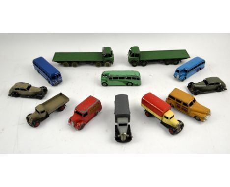 A group of Meccano Dinky Toys to include Foden flatbed trucks, Trojan Dunlop van, Leyland Royal Tiger Duple Roadmaster, etc. 