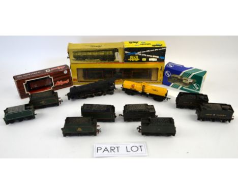 A quantity of Tri-ang locomotives and rolling stock, together with other rolling stock and building parts, some boxed. (qty)P