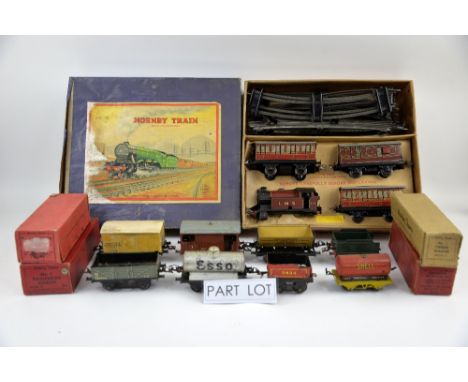 A Hornby Train Tank Passenger Set No. 101, boxed, and a quantity of Hornby clockwork locomotives, carriages and rolling stock