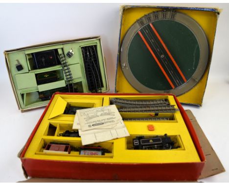 A Triang Railways Rex Train Set and R.P.D. Train Set, together with a Hornby Dublo D1 Turntable, all boxed, completeness unch