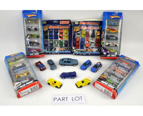 A quantity of boxed and unboxed models, mainly Hotwheels. (qty)Provenance: Single owner stock collection of Robert Dartnell a