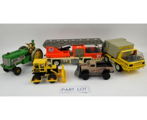 A quantity of larger scale toy vehicles including Tonka. (qty)Provenance: Single owner stock collection of Robert Dartnell an