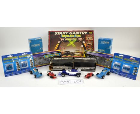 A quantity of Scalextric race cars and boxed accessories including Refuel C8302, Start Light Gantry C209, Standard Hand Throt