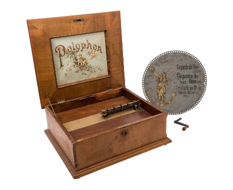 POLYPHON, Anf. 20. Jh, in nussholzfurniertem Holzkasten mit Klappdeckel. HxBxT: 21/52/46, Plattendurchmesser 40 cm. Alters- u
