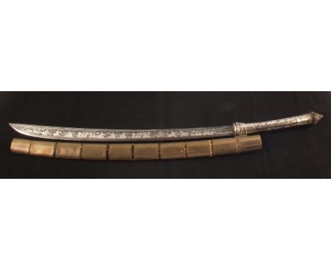 A mid 19th Century Burmese sword (DHA) with heavily engraved blade and decorated white metal covered grip, within its origina