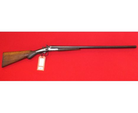 A 12 bore S/S hammer shotgun with approx 29 1/2" barrels, S/No.99751, this item can only be purchased by someone with a curre