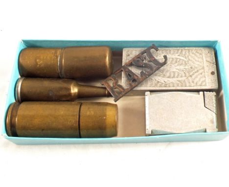 A 'Trench Art' lighter with others