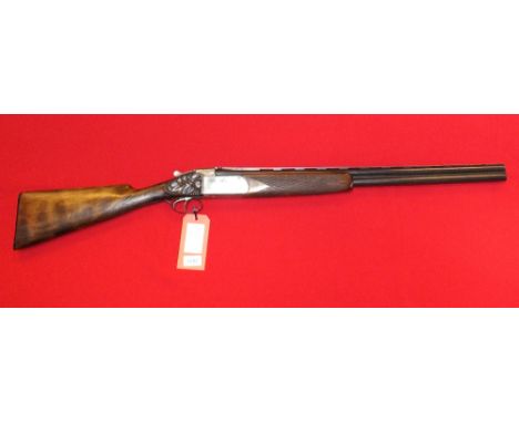 A 16 bore O/U shotgun by Licence A Guichard with 27" barrels, S/No. 9624, this item can only be purchased by someone with a c