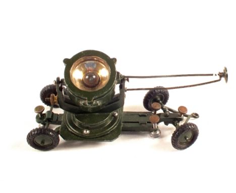 An unboxed Britains Army search light on chassis, 1718