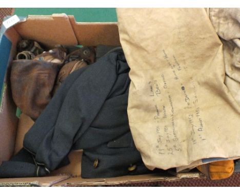 An RAF WWII coastal command flying helmet with G type oxygen mask, pilots jacket, side hat, kit bag and survival pack