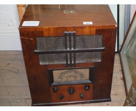 A wooden cased HMV mains radio