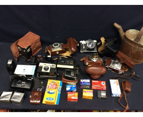 Collection of mid 20th Century to 1980s cameras and accessories to include Kodak, Brownies, Vivitar and also film.