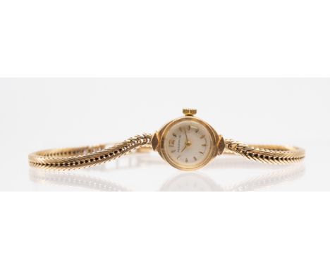 A ladies vintage Mappin 9ct gold wristwatch, comprising a signed round silvered dial with applied gilt baton indices, case ap