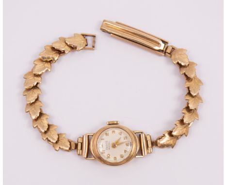 A ladies vintage Tudor Royal 9ct gold wristwatch, comprising a round signed silver dial with applied gilt Arabic indices, cas