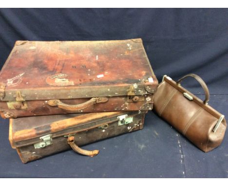  Two vintage leather suitcases, along with a vintage doctors bag.