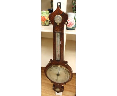 A late George III mahogany banjo wall barometer by P.Cremonini of Wolverhampton.