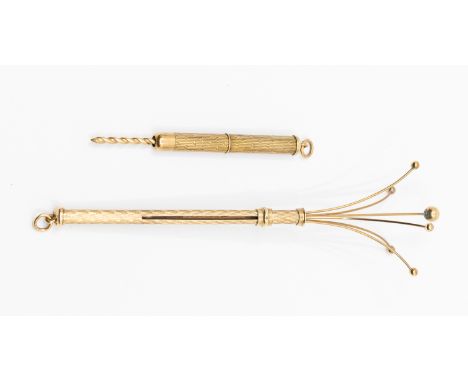 A 9ct gold Swizzle stick with machine engraved decoration, closed length approx 85mm, along with a 9ct gold gold tooth pick w