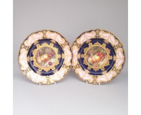 Two Royal Worcester Dessert plates, painted with fruit. One painted with peaches and cherries the other painted with peaches 
