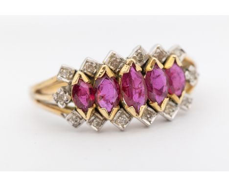 A ruby and diamond 14ct gold dress ring, comprising five graduated claw set marquise cut rubies, with an outer border of smal