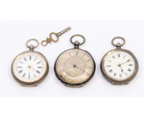 A collection of three ladies silver open faced pocket watches, to include a two with white enamel dials, another with silvere