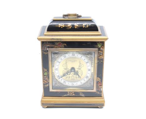 An Elliott of London English chinoiserie designed lacquered clock, retailed by Arthur Saunders (London) small bracket/mantle 
