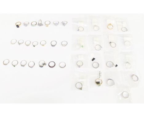 A collection of 38 silver to include various stone set rings, including stones such as tanzanite, (five set with diamond acce