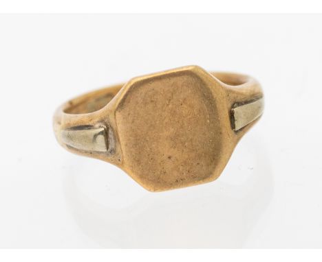 A gents 9ct gold signet ring with square tope and canted corners, raised decoration to shoulders, size O, weight approx 5.6gm