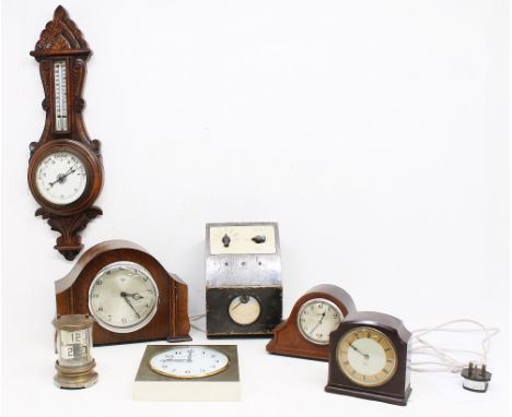 Early 20th Century oak wall barometer along with a collection of early to mid 20th Century wall and mantle clocks.
