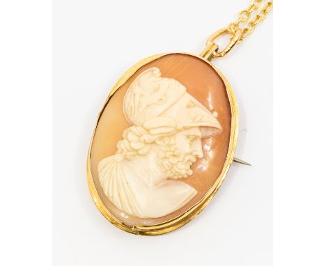 An 18ct gold shell cameo brooch/pendant, depicting a classical male figure possibly Pericles,  length approx 40mm, roller cla