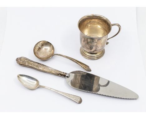 A small collection of silver to include; a Queen Elizabeth II silver christening mug, of plain form with stepped circular bas