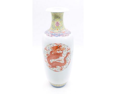 A Chinese porcelain ovoid vase, Qianlong seal mark but probably Republic or later, with Rouge De Fer Dragon roundels, the fol