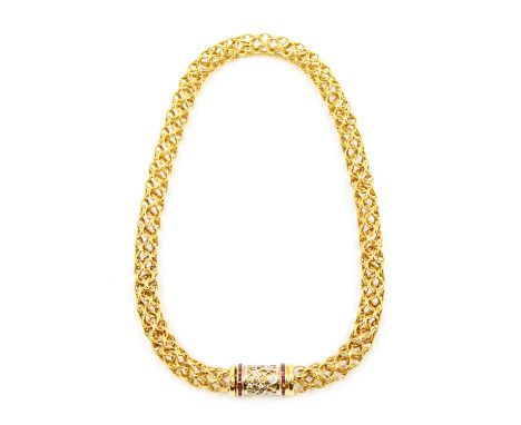 An ruby and diamond set 18ct gold chain necklace by G Graser, comprising an open tube link chain of interlocking circular lin