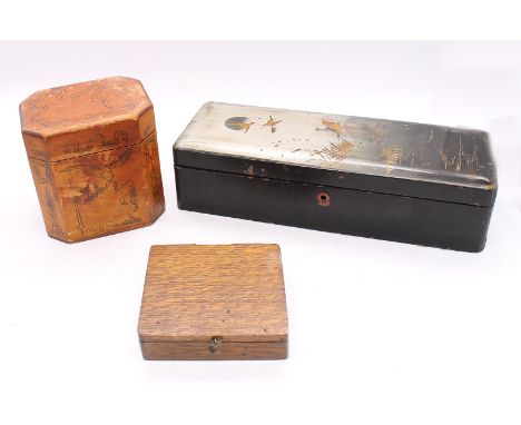 A small quantity of treen boxes to include; a satinwood pokerwork tea caddy with zinc liner, a long lacquered wooden, probabl