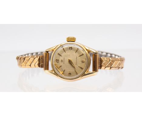 Omega- a ladies vintage gold plated Seamaster wristwatch, with champagne dial, applied gilt arrow markers, case approx 20mm, 